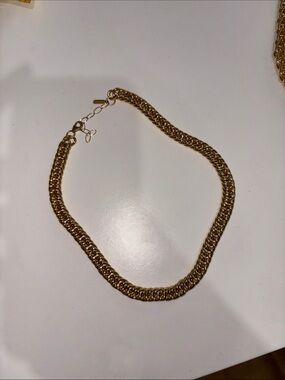 electric picks gold necklace